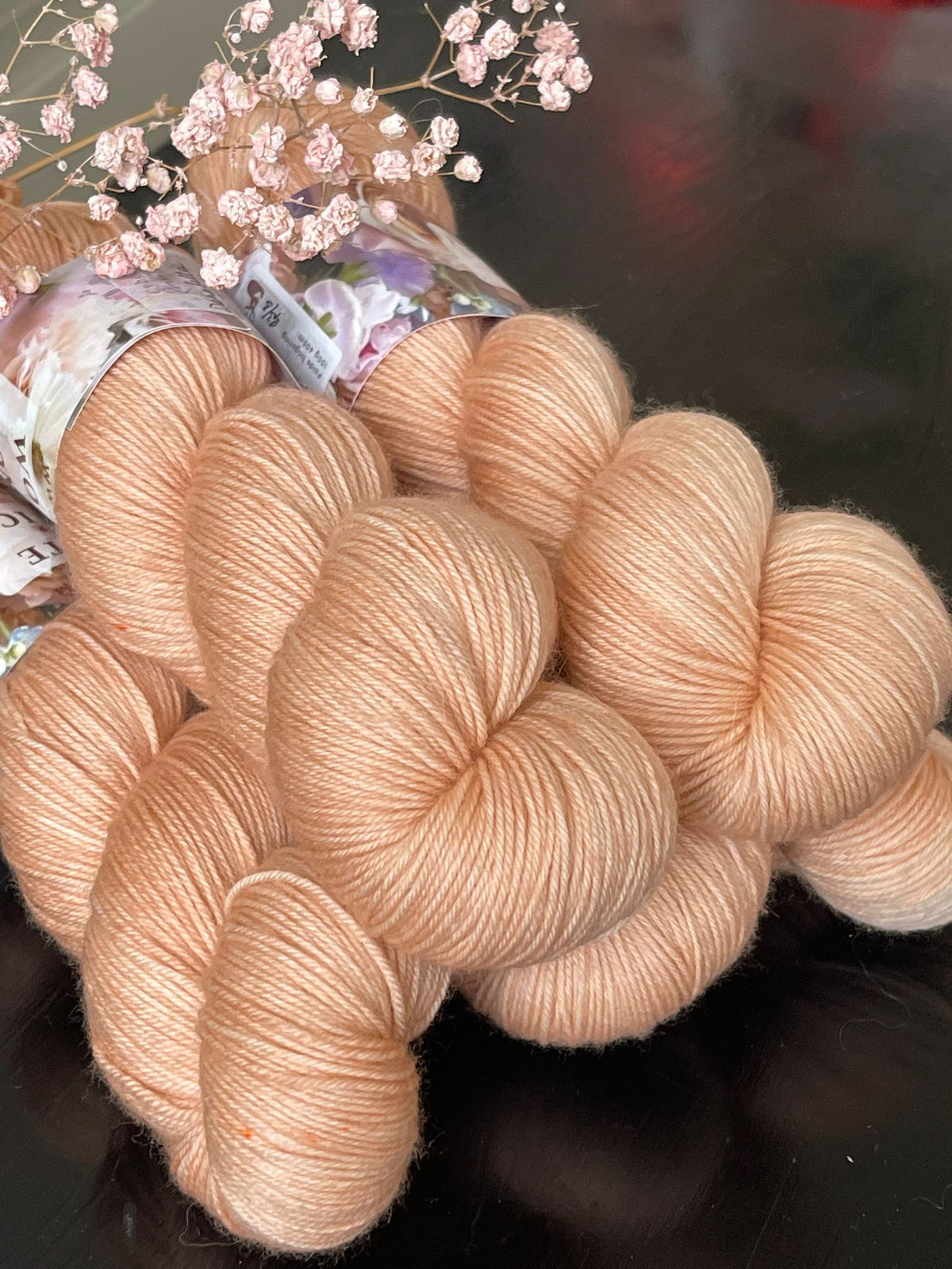 Écheveau laine mérinos nylon fingering Donatella 100g 400m rose abricot pêche Wooliette