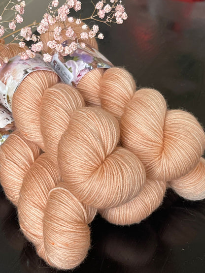 Écheveau laine mérinos nylon fingering Donatella 100g 400m rose abricot pêche Wooliette